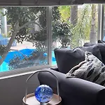 The Electric Blue Abode With A Gorgeous Pool View